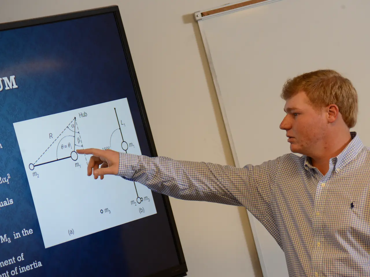 faculty member teaching on touchscreen monitor